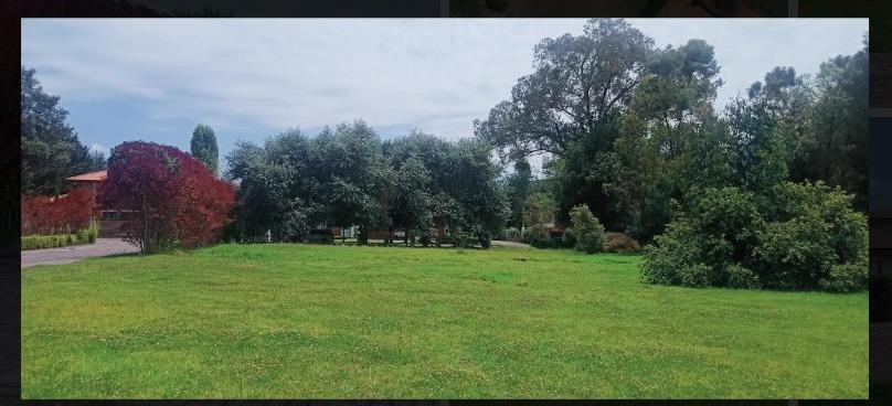 HERMOSO LOTE ESQUINERO RODEADO DE NATURALEZA DENTRO DE URBANIZACIÓN